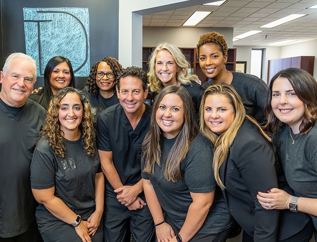 Smiling Upper Arlington dentists and team members