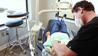 Doctor Tzagournis treating a dental patient