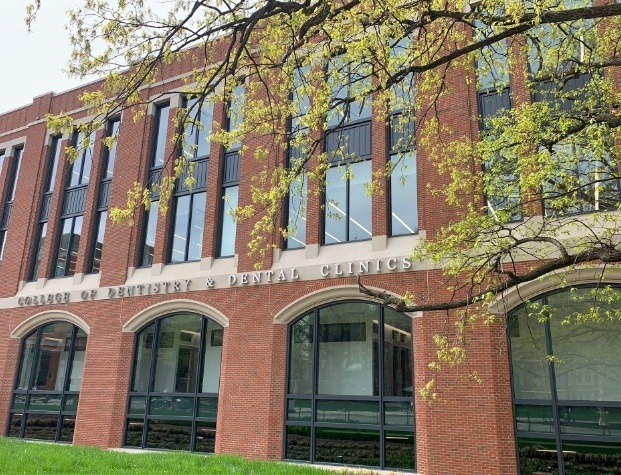 Exterior of building that says College of Dentistry and Dental Clinics