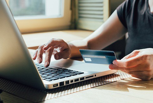 Woman using a credit card