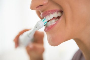 a patient speaking with their dentist